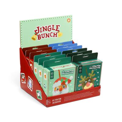 „Jingle Bunch“: pasigaminkite savo pačių pomponų Kalėdų eglutės papuošalą