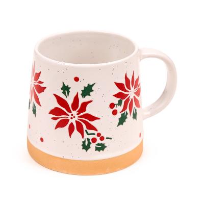 Poinsettia: smailėjantis akmens masės puodelis