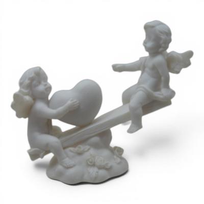 „Dangaus širdis“: meilės širdies sūpynės su cherubais
